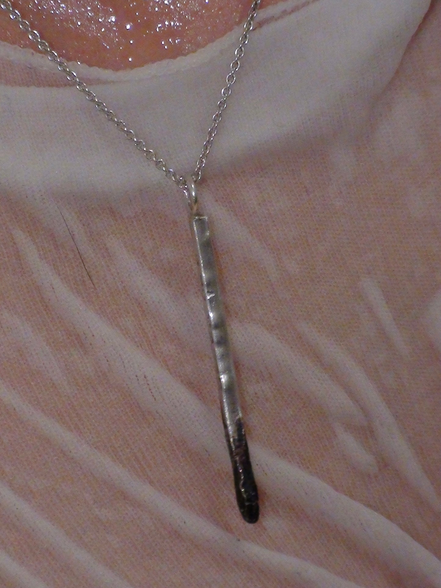 Burnt match mono earring