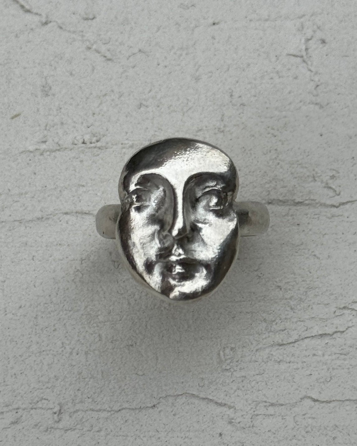 Venus face ring